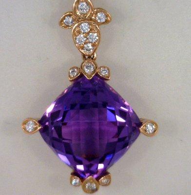 This brilliant amethyst, set in rose gold and diamonds, is just one example of the unique jewelry you'll find at our store!