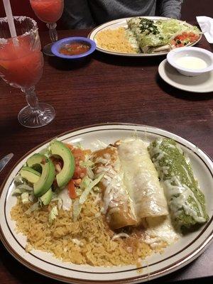 Enchiladas with avocado salad and rice