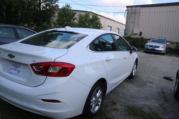 2017 Chevy Cruze on Sam & Tru Auto dealership parking lot.