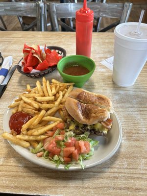 Adult half pound cheeseburger with bacon and crispy fries