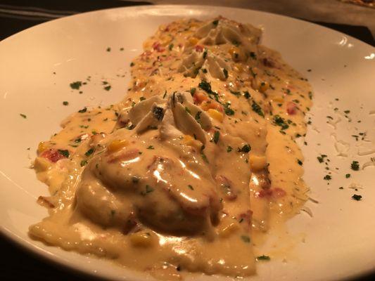 Excellent Smoked Chicken Ravioli with bacon bits and corn kernels in a cream sauce