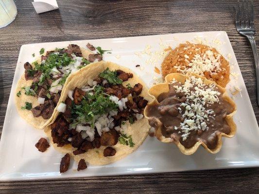 Carne Asada and Pastor taco combo