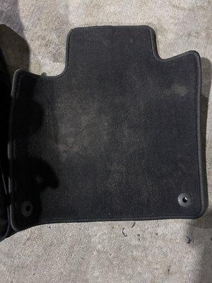 Dusty driver side car mat.