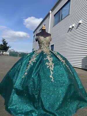 Emerald green glitter quinceañera dress