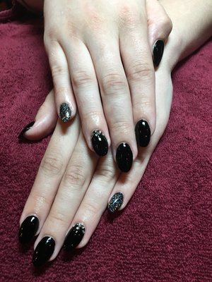 Makrina's senior prom full set of almond shaped acrylic with some rhinestone accents