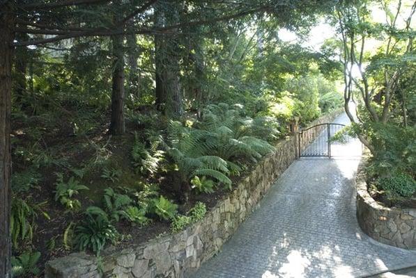 stone wall and drive