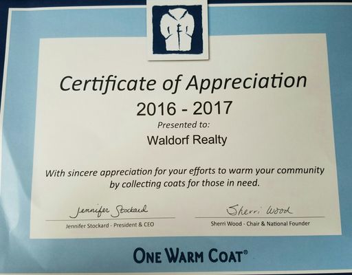 Waldorf Realty active in Community Service One Warm Coat