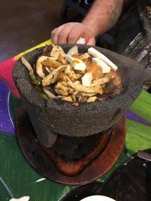 Molcajete! Comes in a piping hot volcanic bowl that stays so hot for the whole meal. Delicious!