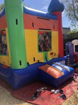 Bouncy house at their huge backyard during the school year-end party