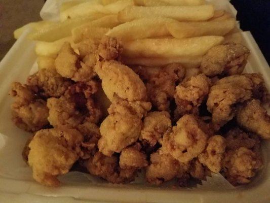 Catfish nugget dinner served with french fries