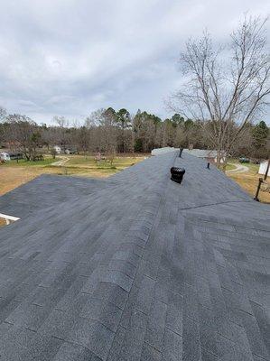 We installed 65 square of CertainTeed XT25 3-tab shingles on this house. Color is Moire Black.