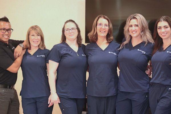 Cosmetic Surgery Center staff coming together on July 27th, 2022 to share their love for their CoolSculpting Elite treatment with patients.