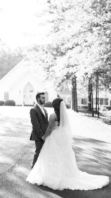 Special moment together for bride and groom outside the chapel.