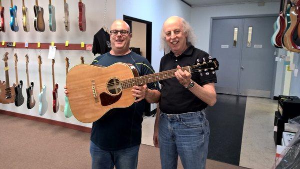 Jim selling me my Gibson J15. Great guitar and a fantastic deal.