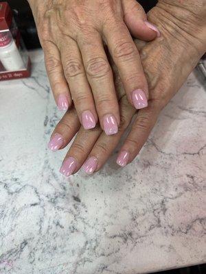 Gel polish with milky pink color