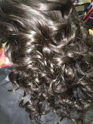 Extensions, sewn in with curls