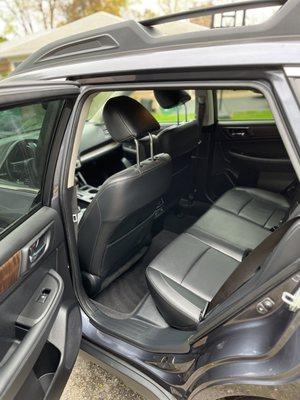 Protected leather seats on a Subaru Outback.