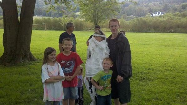 Making a mummy at Halloween