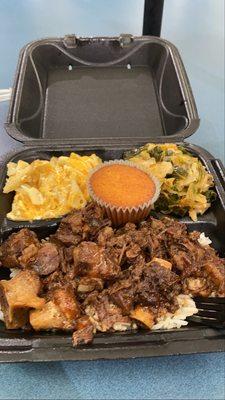 Macaroni and cheese cabbage cornbread white rice and ox tails talking about a great meal in a great experience