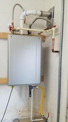 Replaced tank water heater with state of the art tankless heater!