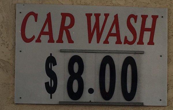 The price of a car wash is gone from $6 to $8.