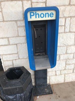 Skeleton of a pay phone outside!!!