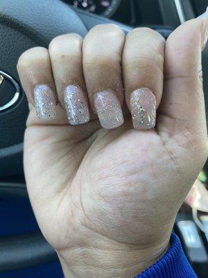 The middle nail is crooked and is not the same polish.