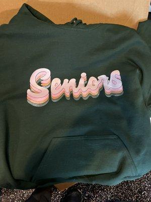 2022 Senior sweatshirts for a local high school. The back has a large 22 with the seniors signatures in the middle.