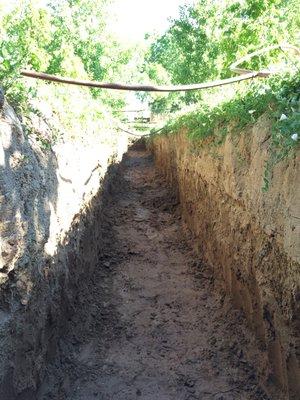 An irrigation trench in progress.