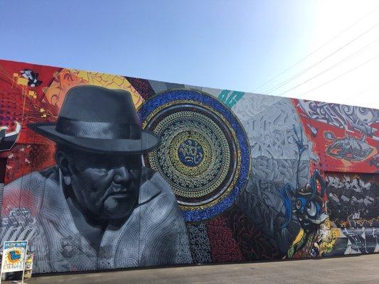 lovely and massive mural outside, not sure who the artist is