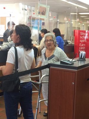 This poor lady had to wait over 45mins in line  smh Bank of America should be ashamed there's no business line either