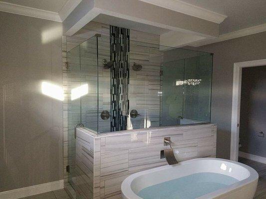 Heavy Glass 
Shower Enclosure 
in Beautiful Bathroom