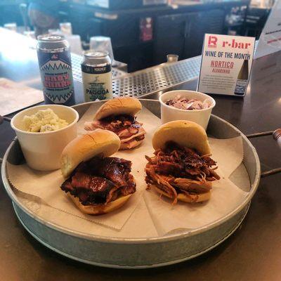 The sandwich trio from the pop-up at R. House: pulled pork, smoked turkey, and beef brisket with potato salad and coleslaw as sides.