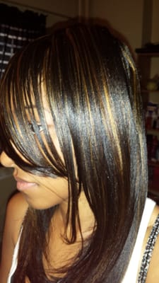 Golden blonde half head highlights with side swoop bangs done by Agueda