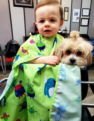 Killian's first haircut was a success! Lucy loved the extra attention also. Plaza Barbershop is great for all ages!