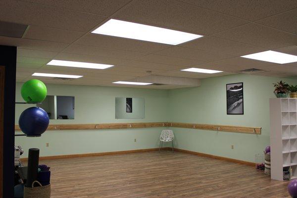 Exercise studio for barre and yoga classes that are taught by Physical Therapists.