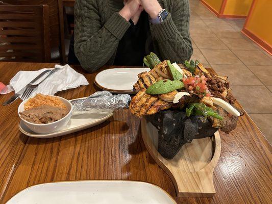 Molcajete with a side of rice and beans