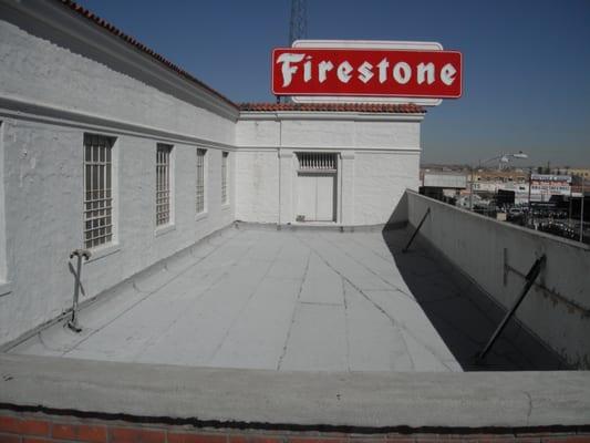 One angle of the finished product. For this job we installed a Firestone brand rubber roof on a Firestone store.