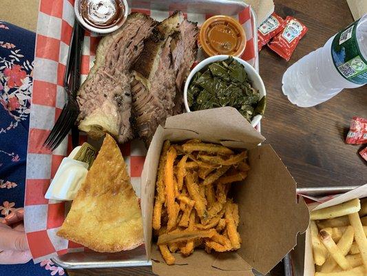 This is my Wife's order of BEEF BRISKET WITH TWO SIDES , Sweet Potatoes, and Colli Green, Corn Bread. MEAT IS JUICY AND DELICIOUSLY