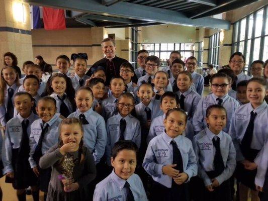 Our wonderful choir with San Antonio's Archbishop!