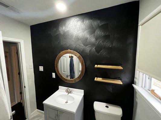 Matte black wall in a bathroom using Emerald by Sherwin-WIlliams