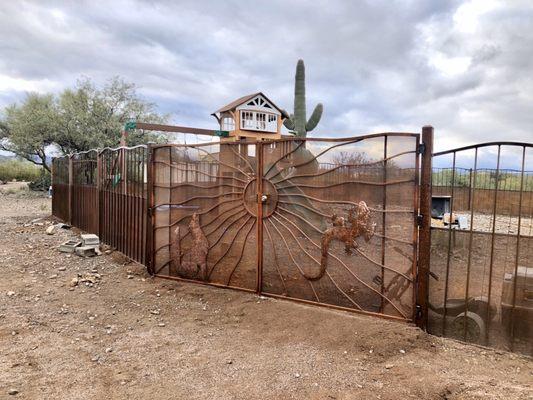 The main double gate entrance into our fenced yard.