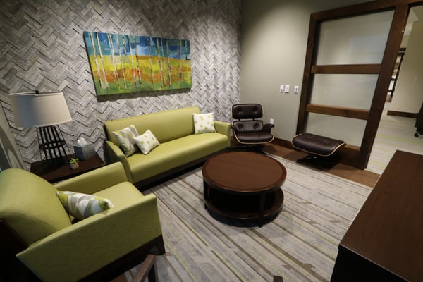 Our meticulously appointed consultation rooms provide a relaxed "living room" feel.