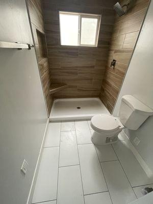 Shower pan, shower trim and toilet installation