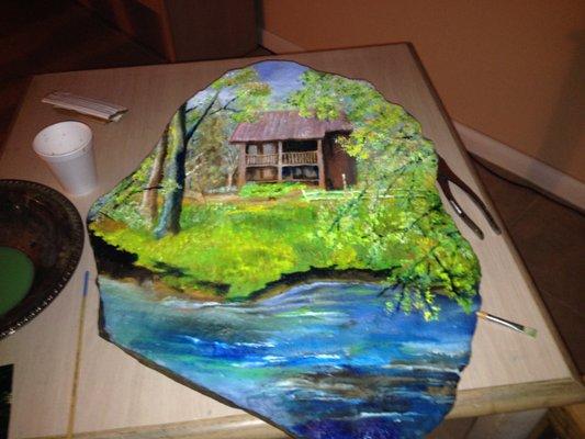 Hand painted river rock by artist Carl Hayes