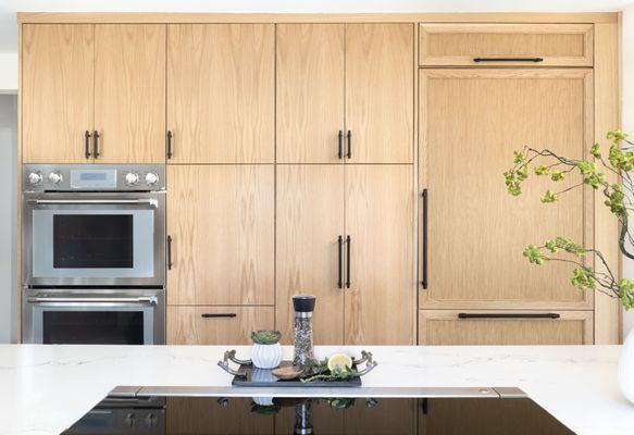 This wellness-centric kitchen boasts custom cabinets, luxe appliances, and a large island. It's perfect for health-conscious empty nesters.