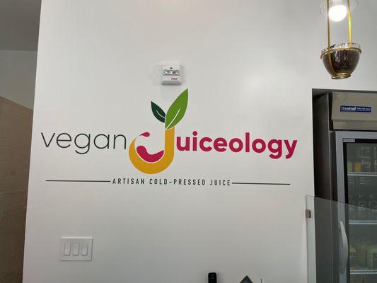 Logo behind front counter