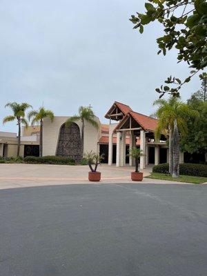 Church to the right of the school