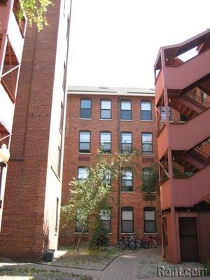 Courtyard from Sparta Ave with secondary building entrance