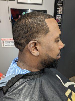 Mis taper cut with h taper beard and edge up.